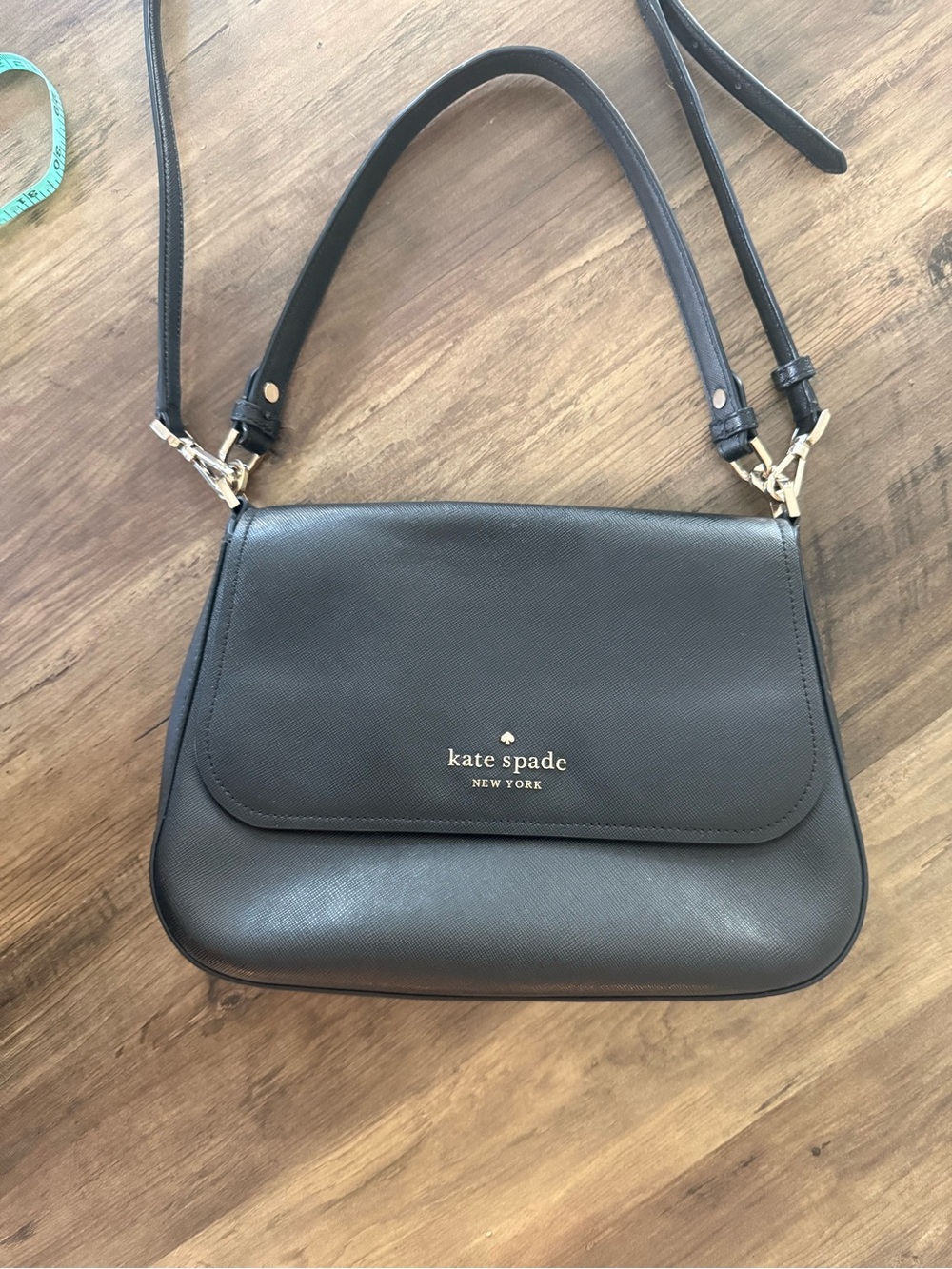 kate spade Black Leather handbag Bag with crossbody leather strap Gold Accents